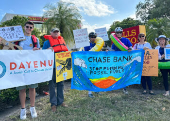 Broward County residents held a protest in front of Bank of America and Wells Fargo Bank in Hollywood on March 21. Those attending found out about the event through the Get My Money Out (GMMO) divestment group in Broward County or signed up through the Third Act website using information sent around by Third Act nationally. (Submitted image)