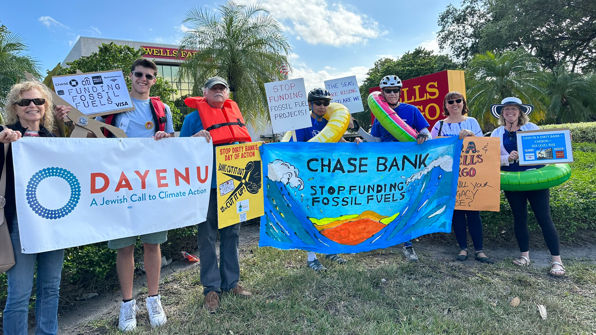 Broward County residents held a protest in front of Bank of America and Wells Fargo Bank in Hollywood on March 21. Those attending found out about the event through the Get My Money Out (GMMO) divestment group in Broward County or signed up through the Third Act website using information sent around by Third Act nationally. (Submitted image)