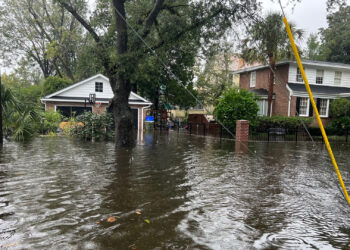 Hurricane Ian flooding to homes and streets in Pawleys Island, S.C. (State Farm, CC BY 2.0, via Wikimedia Commons)