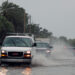 Cars pass through a flooded road during Hurricane Nicole in Palm Beach in 2022. (iStockphoto image)