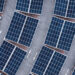 An aerial view of solar panels on a parking lot rooftop. (iStockphoto image)
