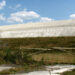 A phosphogypsum stack located near Fort Meade. These stacks contain the waste byproducts of the phosphate fertilizer industry. (Via Wikimedia Commons)