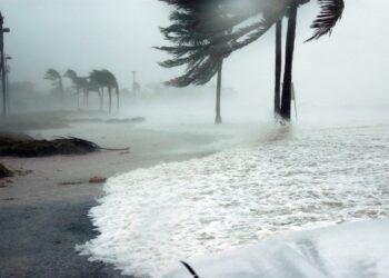 Water fills a beach during a storm