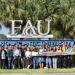 Florida Atlantic University’s Center for Environmental Studies hosts the annual International Water Professionals Program, which brings graduate students from the IHE Delft Institute for Water Education to South Florida. Here they pose with a Burmese python skin and head)used in one of their demonstrations. (Submitted photo)
