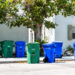 Trash cans and recycling bins line a street in Key West. (iStock image)