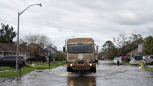 Louisiana National Guard members rescue citizens stranded in their homes in the wake of Hurricane Ida. (The National Guard, CC BY 2.0, via Wikimedia Commons)