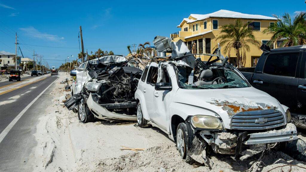 Vehicles damaged by Hurricane Ian (iStock image)