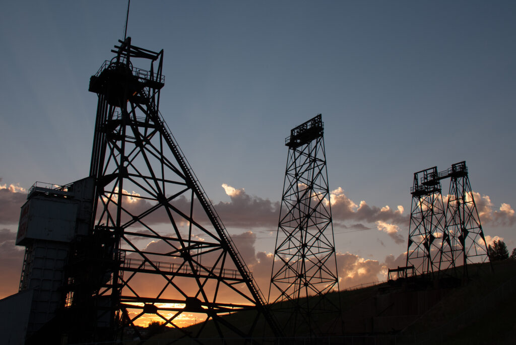 Mining towers are silhouetted against the sunset in Butte, Montana. (iStock image)