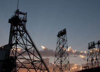Mining towers are silhouetted against the sunset in Butte, Montana. (iStock image)