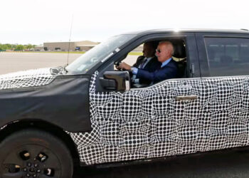 President Joe Biden test drives a Ford F-150 Lightning all-electric pickup at Ford’s Rouge Electric Vehicle Center in Dearborn, Michigan, in 2021 (The White House, Public domain, via Wikimedia Commons)