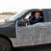 President Joe Biden test drives a Ford F-150 Lightning all-electric pickup at Ford’s Rouge Electric Vehicle Center in Dearborn, Michigan, in 2021 (The White House, Public domain, via Wikimedia Commons)