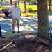 Dr. Andrew Koeser, UF/IFAS associate professor of environmental horticulture, demonstrates a tree root defect. (Photo courtesy of Deb Hilbert)