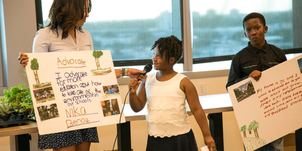 Graduates of the youth portion of Catalyst Miami's climate justice training, CLEAR, give their presentations. (Credit: Catalyst Miami)