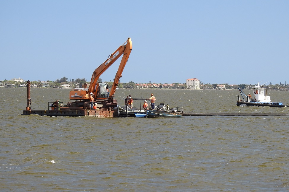 Muck removal, macroalgal blooms and brown tide in the Indian Lagoon near Turkey Creek, where approximately 27,000 septic systems drain into the lagoon. (Credit: Brian Lapointe, FAU Harbor Branch)