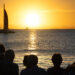 A group watches the sunset from Mallory Square in Key West (watts_photos, CC BY 2.0, via flickr)