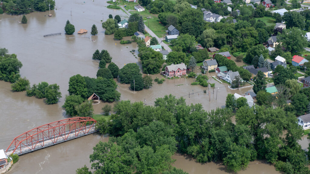 An aerial view of extensive flooding in July in Vermont, which is often named as a "climate haven." (The National Guard, CC BY 2.0, via Wikimedia Commons)