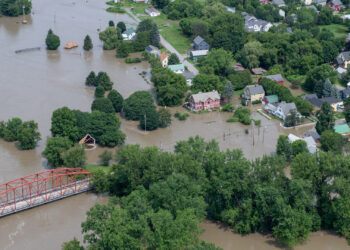 An aerial view of extensive flooding in July in Vermont, which is often named as a "climate haven." (The National Guard, CC BY 2.0, via Wikimedia Commons)