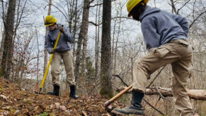 An AmeriCorps National Civilian Community Corps team working on a trail project in 2021. (AmeriCorps, Public domain, via Wikimedia Commons)