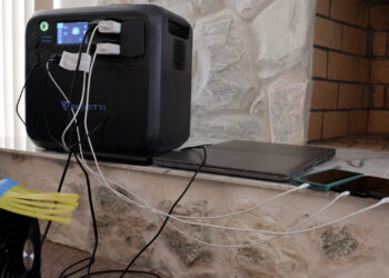 A solar generator power a laptop and other electronic devices. (FAU Center for Environmental Studies)