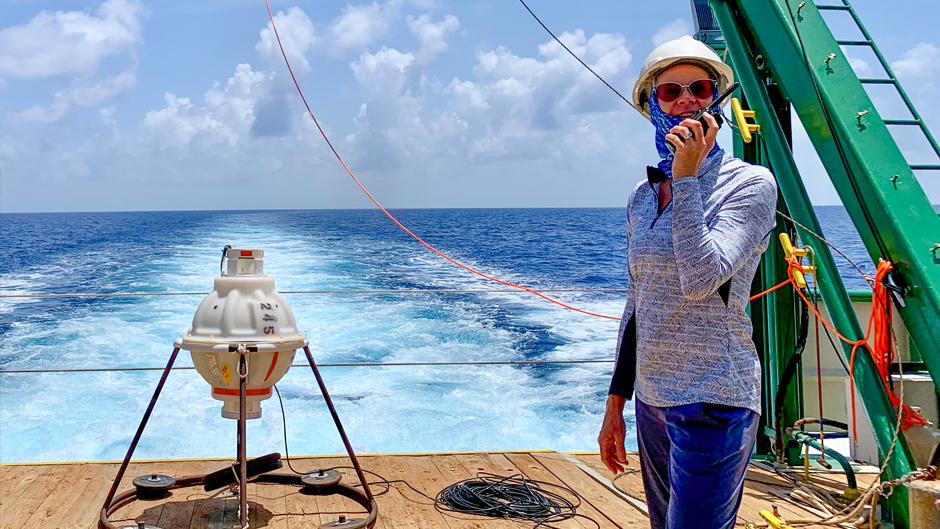 Scientist Lisa Beal coordinates with officers on the bridge of the F.G. Walton Smith for the deployment of an instrument to monitor sea level, heat, and salt content within the Florida Straits. (University of Miami)