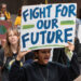 Young people participate in a climate protest. (Mark Dixon, CC BY 2.0, via Wikimedia Commons)