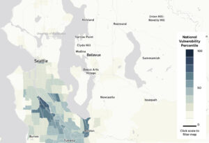A map shows a divide between the North and South Seattle, with darker tones indicating areas that are more vulnerable to environmental hazards. (The U.S. Climate Vulnerability Index; Mapbox/OpenStreetMap)