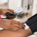 A doctor measures a patient's blood pressure (iStock photo)