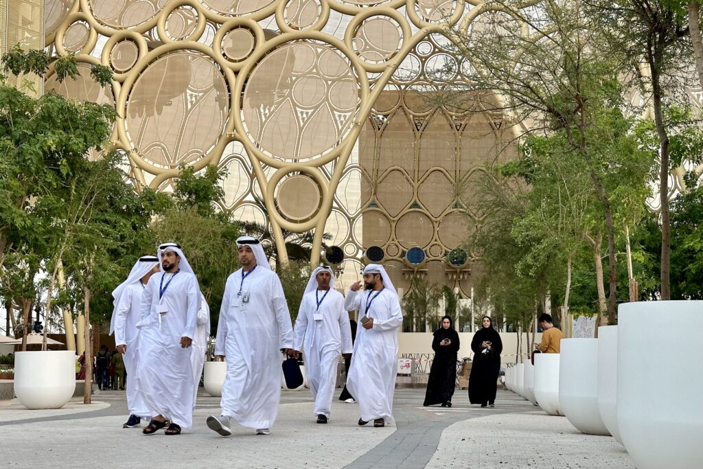 The venue for COP28 was the sprawling Expo City complex of more than 100 medium-sized buildings and several large plenary halls. The Emiratee hosts were apparent and prominent in their traditional, immaculate white garb and impeccably groomed black mustaches and beards. It was clear who was hosting and who was in charge of this world event. (Photo by Michal Fidler, text by John Capece)