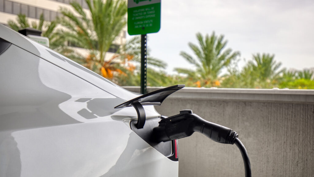 An electric vehicle charging in a parking garage in St. Petersburg. (iStock image)