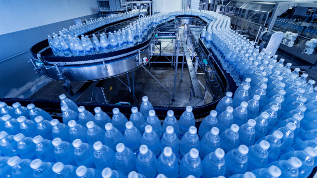 A conveyer belt of bottled water (iStock image)