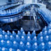A conveyer belt of bottled water (iStock image)