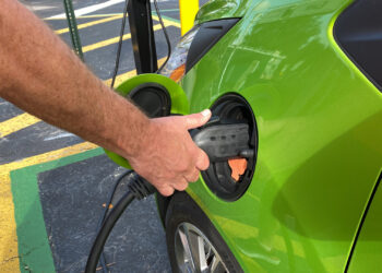 An electric vehicle charging at a free public charging station in Orlando (iStock image)