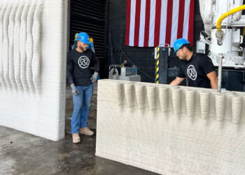 Workers at Kind Designs with 3D-printed panels for a private seawall project in Miami. (Kind Designs photo)