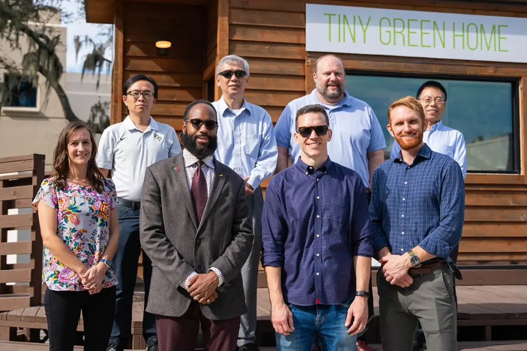 Members of the UCF REACH Hub project team include (front row, from left) principal investigator Kelly Stevens, co-principal investigator L. Trenton S. Marsh, senior personnel Kristopher Davis, senior personnel Ian Lahiff, (back row, from left) co-principal investigators Yue Ge and Zhihua Qu, senior personnel Michael Hess with the City of Orlando, and co-principal investigator Liqiang Wang. (Photo Credit: Blake Osting, CCIE Communications)