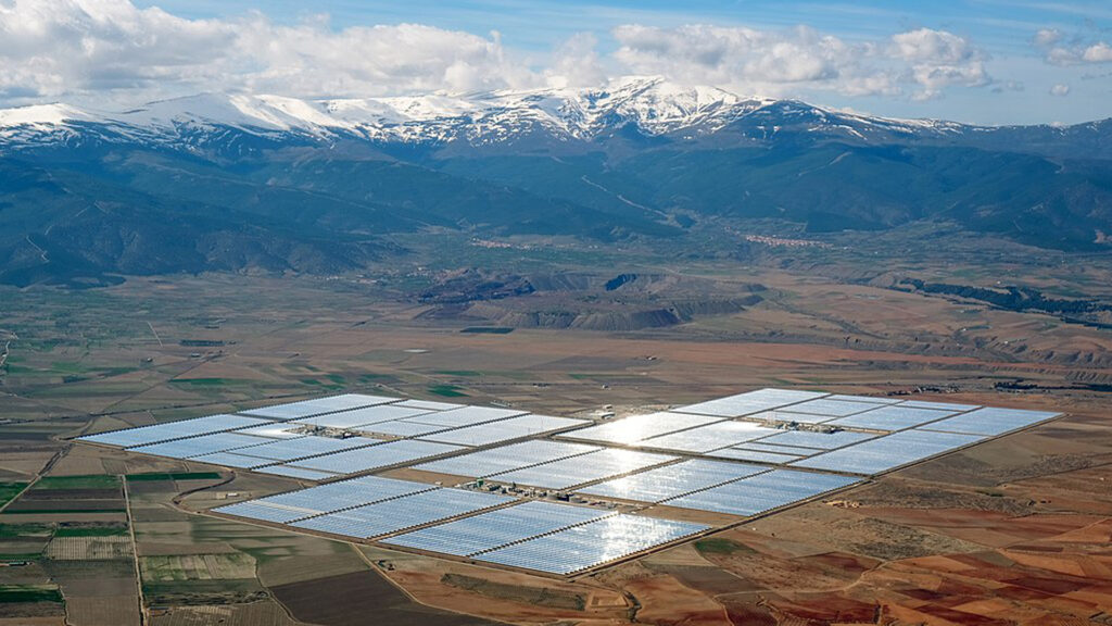 Andasol Solar Power Station. Solar energy is increasingly widespread in countries across all regions. The installed capacity of solar photovoltaic is poised to surpass coal by 2027 and become the largest installed capacity of energy in the world. (kallerna, CC BY-SA 4.0, via Wikimedia Commons)