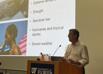Florida State Climatologist David Zierden speaks Thursday at the 9th Annual Climate Communications Summit at the University of Florida in Gainesville. (Nathan Crabbe photo)