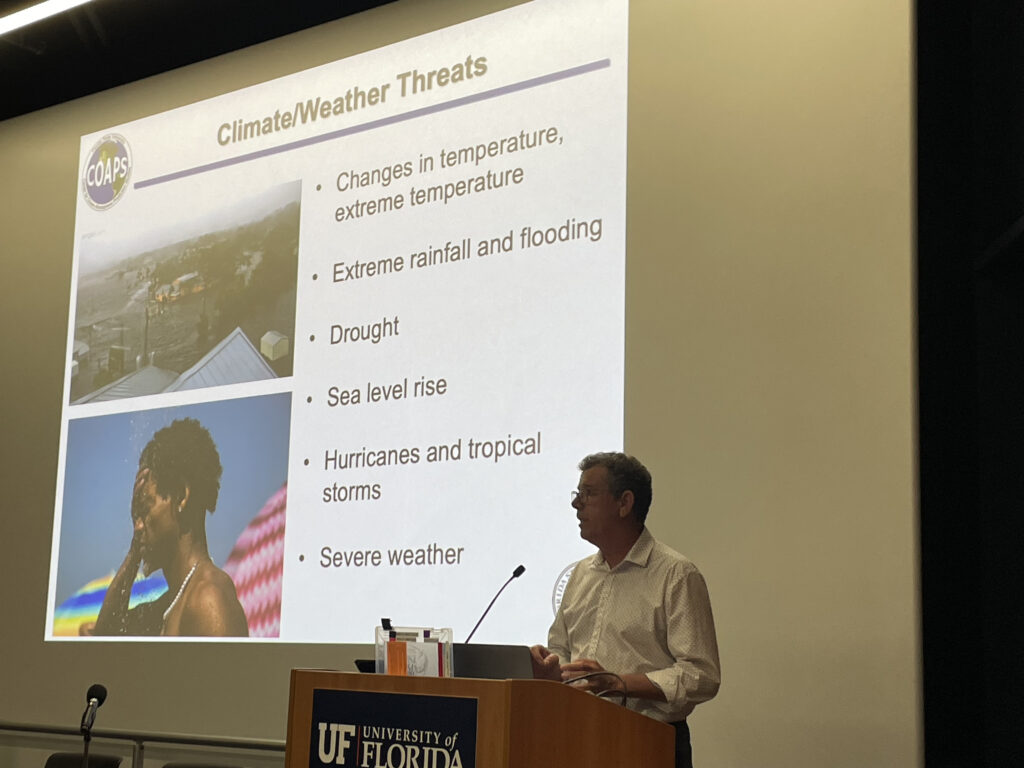 Florida State Climatologist David Zierden speaks Thursday at the 9th Annual Climate Communications Summit at the University of Florida in Gainesville. (Nathan Crabbe photo)