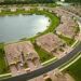 A retention pond surrounded by homes (iStock image)