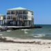 A house on Dauphin Island has been stranded out in the Gulf, as the beaches around it erode away. (Carrie Stevenson, UF/IFAS Extension)
