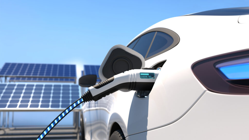 A 3D illustration of an electric car charging and solar panels (iStock image)
