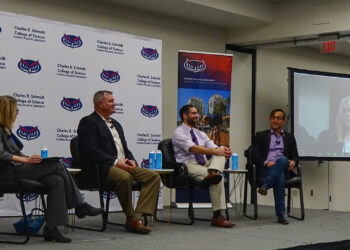 Participants in a panel discussion at Florida Atlantic University on the Florida Wildlife Corridor, from left: Valery Forbes, dean of the FAU Charles E. Schmidt College of Science; Charles “Buck” MacLaughlin, range operations officer at Avon Park Air Force Range; Joshua Daskin, director of conservation at Archbold Biological Station; Colin Polsky, founding director of the FAU School of Environmental, Coastal, and Ocean Sustainability (ECOS); and state Rep. Lindsay Cross, D-St. Petersburg (over video stream). (Photo by Naomi von Bose, FAU CES)