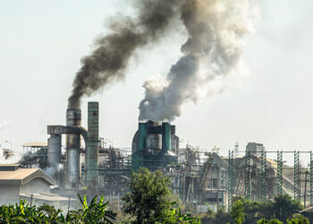 Pollution is emitted from a manufacturing plant overseas. (iStock image)