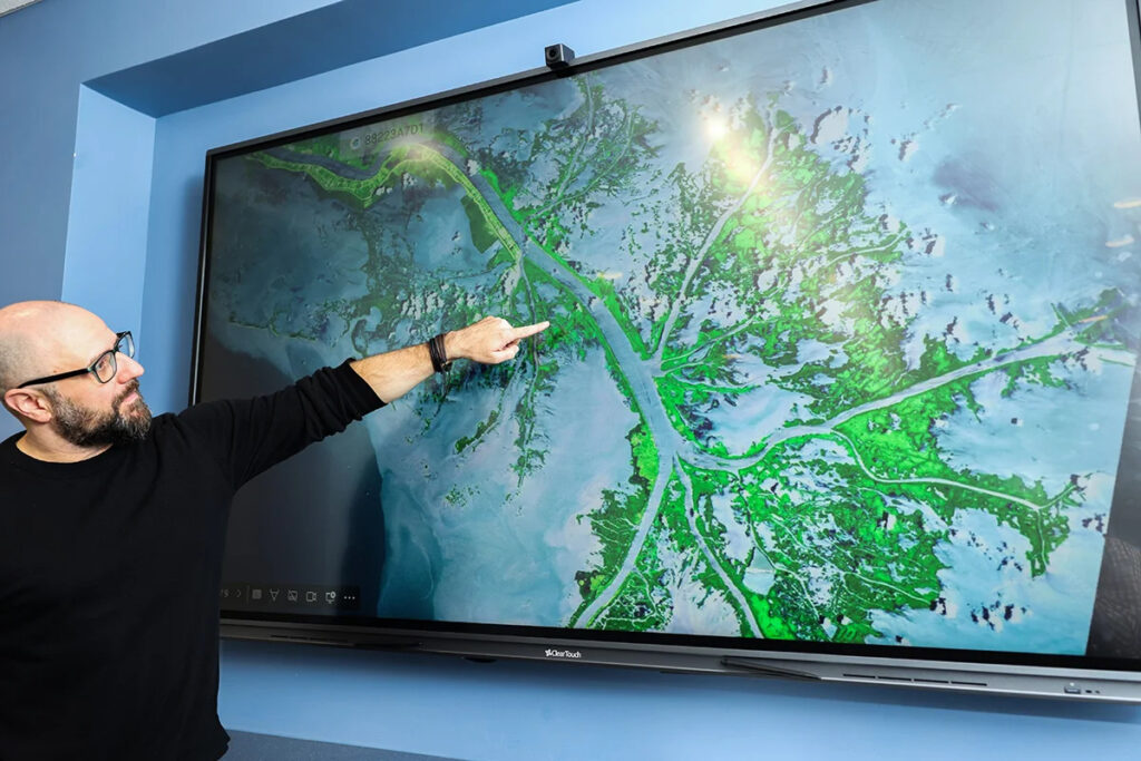 UCF Coastal and Civil, Environmental and Construction Engineering associate professor Thomas Wahl shows the lowermost part of the Mississippi River Delta where the research will be focused. (UCF)