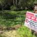 An algae alert sign posted by the Lee County Health Department on the Orange River (Submitted image)