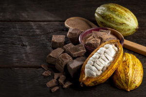 Cocoa with chocolate pieces and chocolate powder on a table (iStock image)