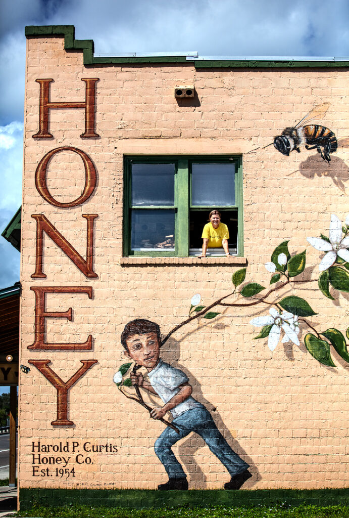 LaBelle, Florida: Rene Pratt runs her family’s store, Harold P. Curtis Honey Co. in LaBelle, Florida near the Caloosahatchee Canal as it flows southwest from Lake Okeechobee. Harold P. Curtis Honey Co. was established in 1954. (Patrick Farrell for WLRN)