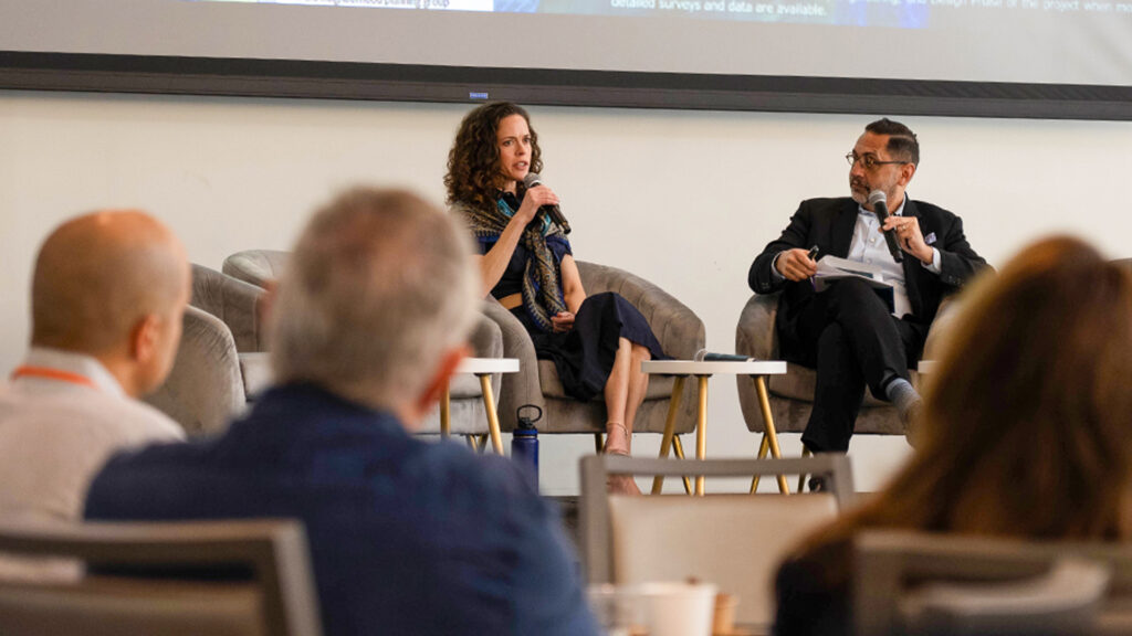 Annie Lord, executive director of Miami Homes for All, with Carlos Martín, director of the Remodeling Futures Program, during the symposium’s opening keynote panel. (Matthew Rembold/University of Miami)