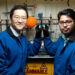 From left, Associate Professor Hoyong Chung and postdoctoral researcher Arijit Ghorai display the two phases of their degradable polymer at the Dittmer Chemistry Lab at Florida State University. (Scott Holstein/FAMU-FSU College of Engineering)