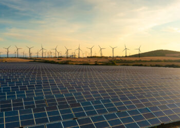 Solar panels and wind turbines (iStock image)