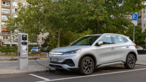 An electric vehicle made by Chinese automaker BYD charges on a street in Germany (iStock image)